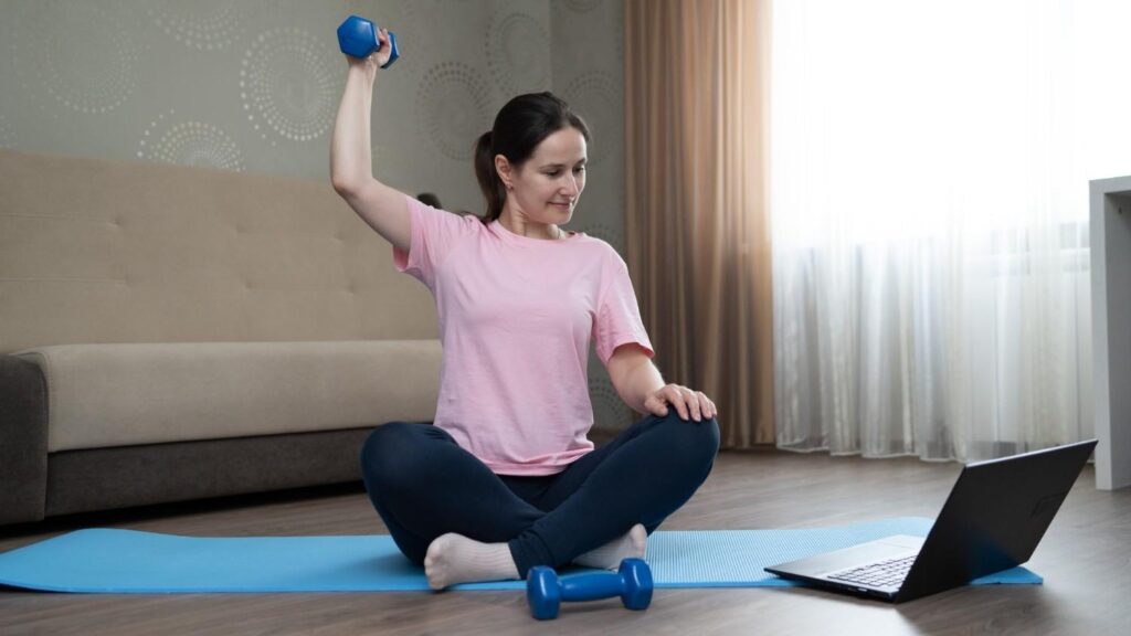 Women’s home gym equipment including light dumbbells, fitness bands, and compact machines.