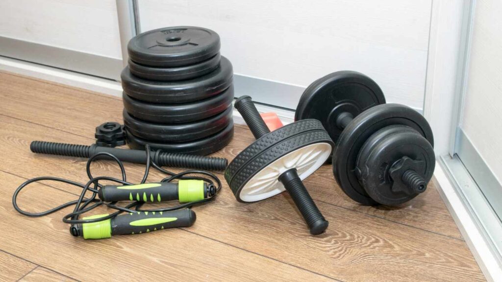 Used home gym equipment being inspected before purchase for quality and durability.